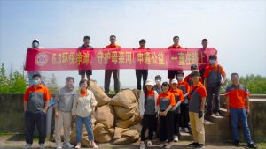 响应“世界环境日”号召 申通联合崇明水务局海塘管理所 开展“环保净滩”活动-物流之家